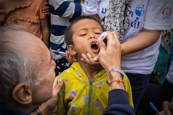 Two drops is all it takes to immunize a child. The first child screamed his poor little head off.  This one was more cooperative as you can see.  It sure pulled the heart strings....and I didn't have to fly to India as other fellow Rotarians did...LOL