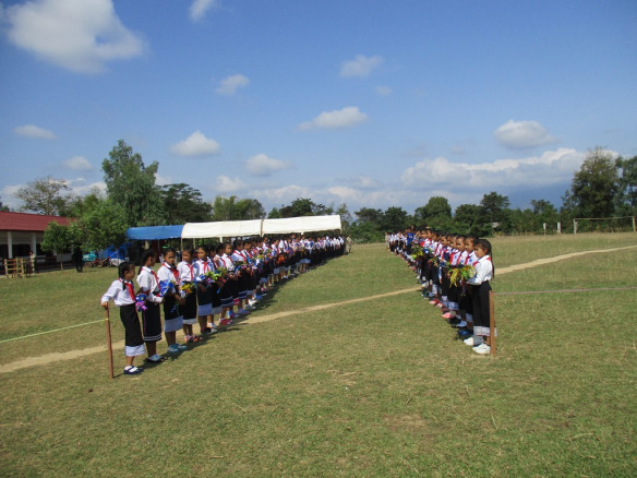 Students lined up to show respect for their sponsors