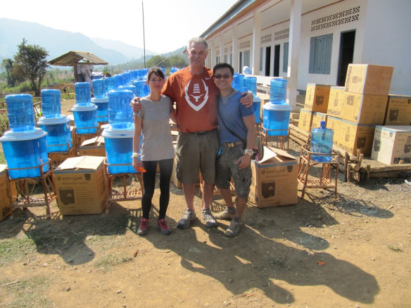 Celia, Art and Mike pose after setup was done.  Meanwhile Siphan and I are teaching the hygiene course on a hill side behind the school.
